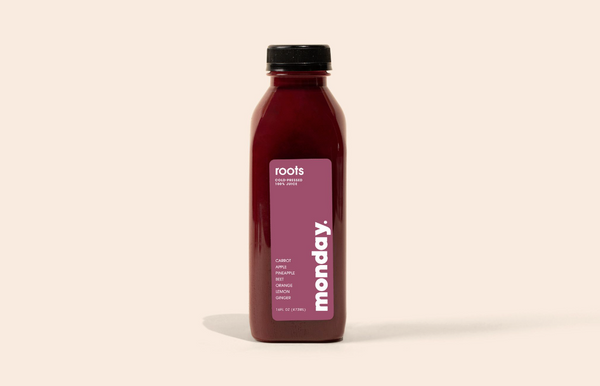 Roots Cold-pressed Juice featuring beet and carrot blend for wellness and energy.